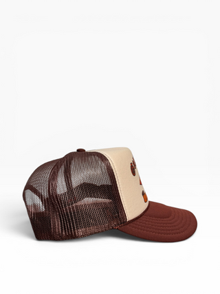 Gold Dogs Live Free Brown Banner Trucker hat