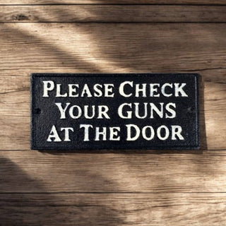Check Your Guns At The Door Cast Iron Sign